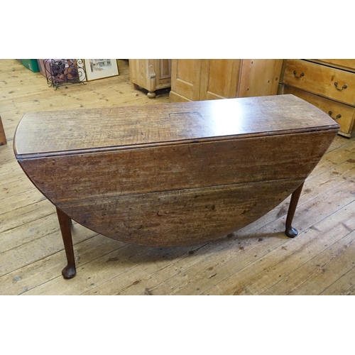 524 - A Georgian Mahogany Drop Flap Dining Table resting on Pad Feet. Measuring: 148cms across x 47cms (Cl... 