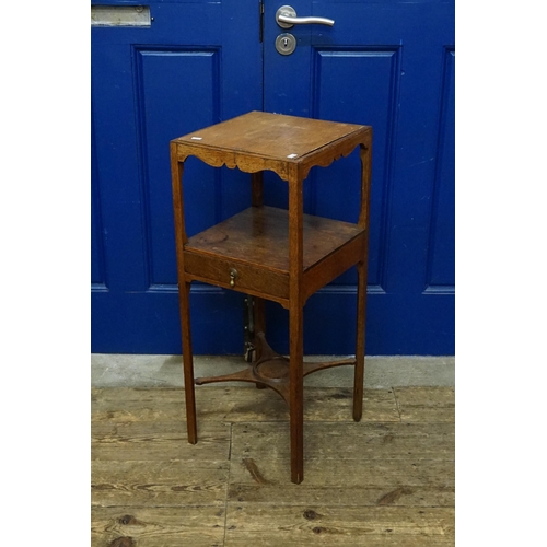 519 - A Victorian oak single drawer wash stand. Under tier.