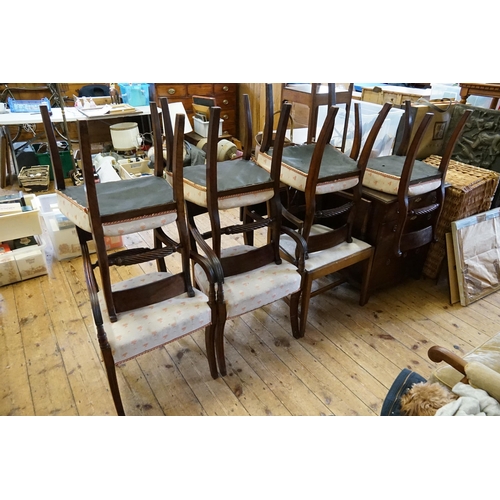 520 - A set of six regency curved back rope pattern chairs, with sabre legs. Along with one other.