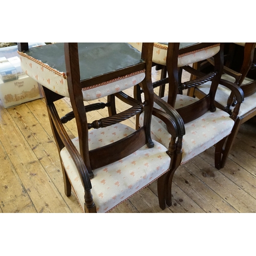 520 - A set of six regency curved back rope pattern chairs, with sabre legs. Along with one other.