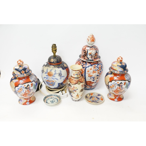 646 - A pair of Imari ginger jars and covers, along with one other, etc.