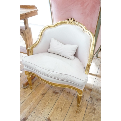 571 - A French Gilt Floral Carved Drawing Room Chair with a Ribbon Back & Resting on Fluted legs upholster... 