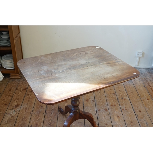 575 - A Victorian Mahogany Fold-Over Top Tea Table resting on a Tripod Base with Pad Feet & turned Column.... 