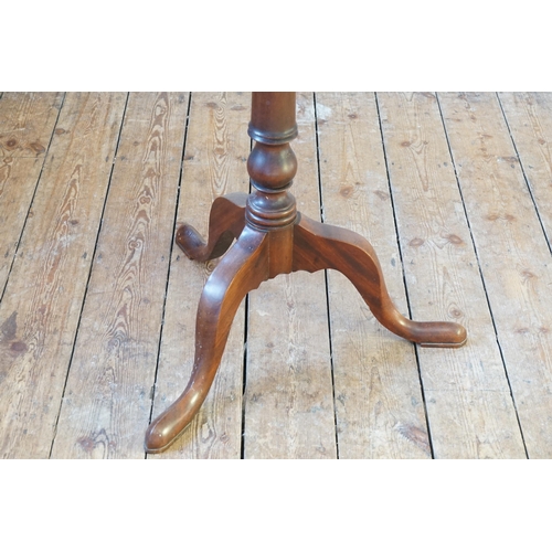 575 - A Victorian Mahogany Fold-Over Top Tea Table resting on a Tripod Base with Pad Feet & turned Column.... 