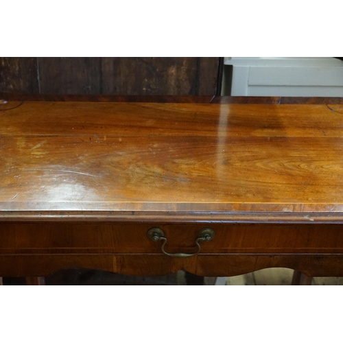 560 - A Georgian Mahogany & Cross Banded Single Drawer Side Table resting on square legs with a Glass Top.... 