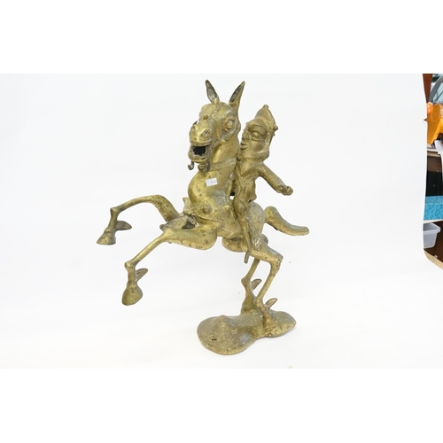 918 - A Benin Study of a Warrior on his Prancing Horse. Measuring: 51cms High.