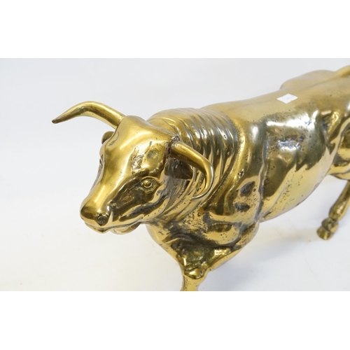 906 - A Very Heavy Brass Study of a Bull. Measuring: 46cms long x 22cms high.