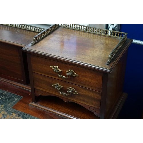 587 - An Edwardian Mahogany Gentleman's Desk fitted with Side Drawers, Drop Down Letter Compendium, Brass ... 