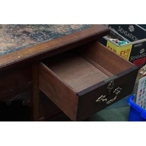 587 - An Edwardian Mahogany Gentleman's Desk fitted with Side Drawers, Drop Down Letter Compendium, Brass ... 