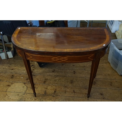 600 - A Georgian Mahogany & Cross Banded Fold Over Top Adams design Tea Table resting on square legs & Spa... 