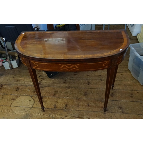 600 - A Georgian Mahogany & Cross Banded Fold Over Top Adams design Tea Table resting on square legs & Spa... 