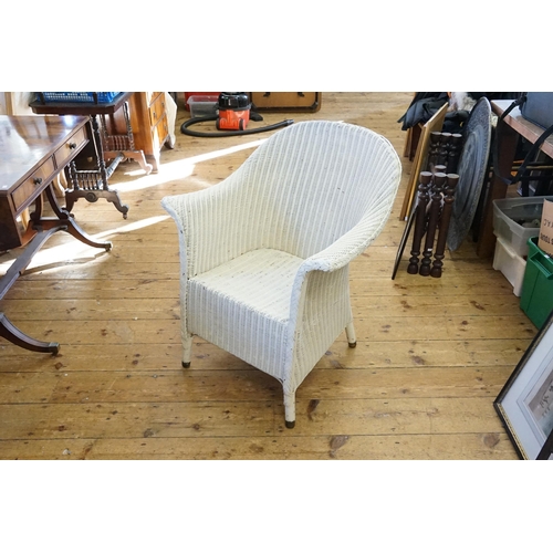 603 - A Lloyd Loom Chair in White.