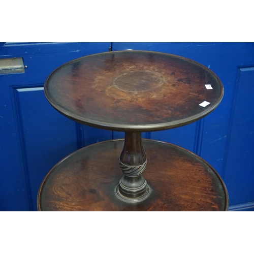 605 - An 18th Century Mahogany Three Tiered Dumb Waiter resting on a Tripod Base. Measuring: 58cms wide to... 