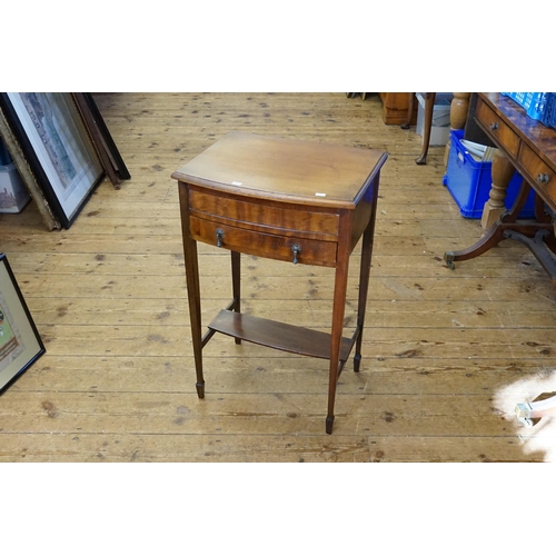 607 - A Cuban Mahogany Veneered Bow Fronted Needlework Table resting on square legs. Measuring: 45cms acro... 