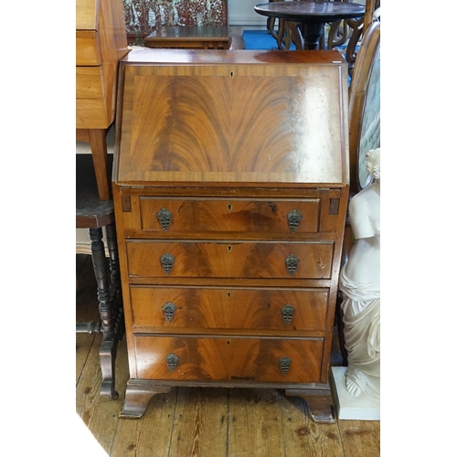 609 - A Reproduction Cuban Mahogany & Cross Banded Writing Desk with Fitted Drawers. Measuring: 58cms acro... 