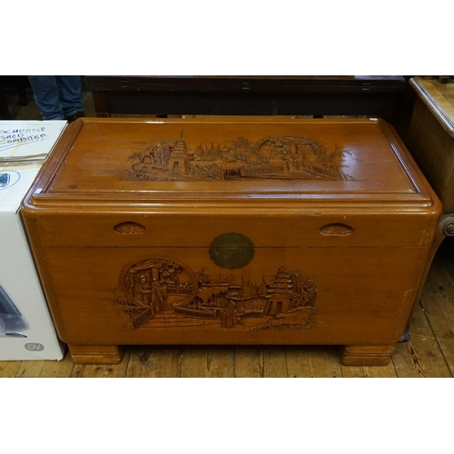 610 - A Chinese Carved Top Hardwood Coffer with a decorated Top of Garden Scenes & the front with rural sc... 