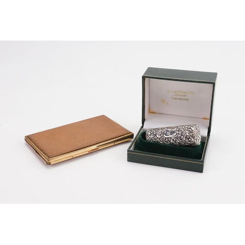 93 - A Silver coloured embossed Perfume Bottle Case containing a Silver Coloured Sewing Set & a Cigarette... 