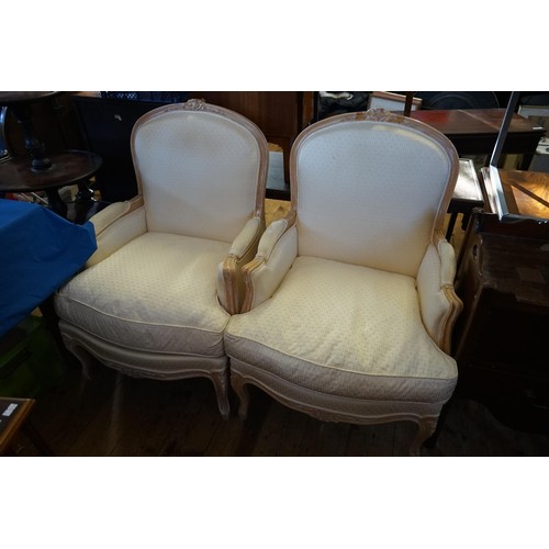 598 - A Pair of French design Beech Lined Fauteuils Chairs upholstered in Cream Damask.