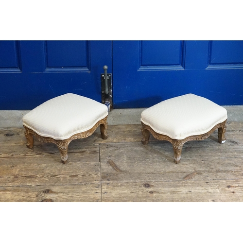 599 - A Pair of interesting French Foot Stools in Oak with gadrooned decoration upholstered in Cream damas... 