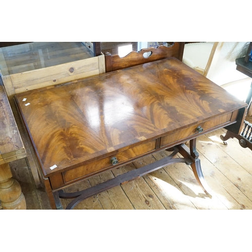 592 - A Cuban Mahogany Veneered Drop-Flap Sofa Table with fitted Drawers & resting on reeded supports. Mea... 