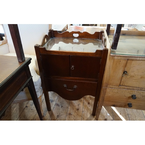 594 - A Georgian Mahogany Tray Top Bedside Cupboard fitted with two doors resting on square legs. Measurin... 