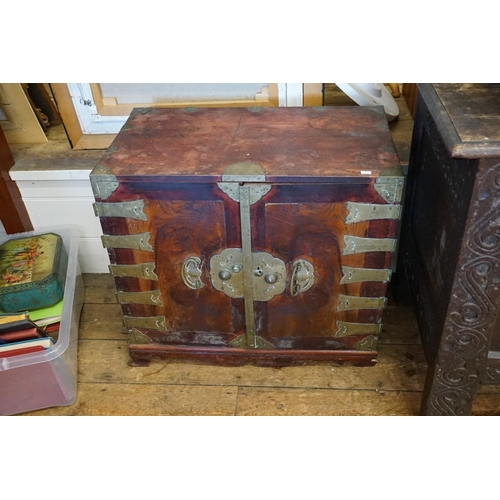 542 - A Japanese/Korean Two Door Metal mounted Storage Chest fitted with Drawers. Measuring: 69cms across ... 