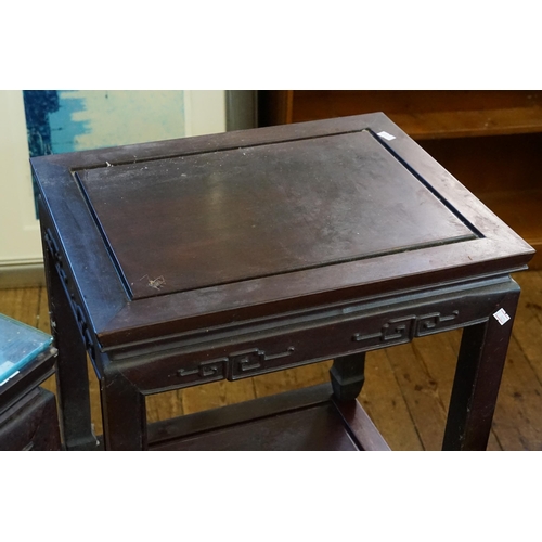 545 - A Set of Four Japanese Hardwood Whatnot Tables with inset Top Panels, Key Boarded Tops & Scroll Feet... 