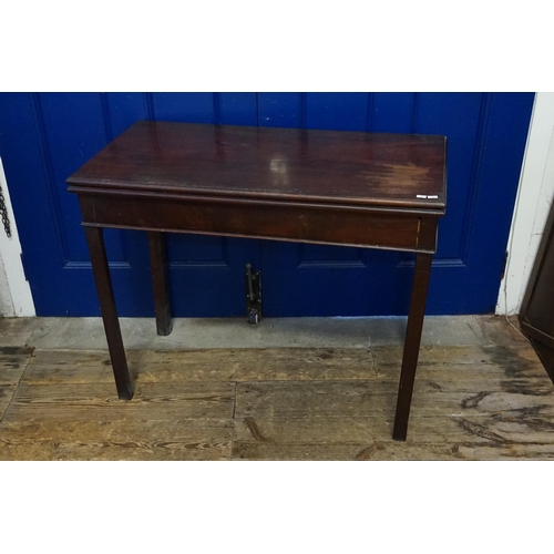 553 - A Georgian Mahogany Fold-Over Top Card Table with Champered inside Leg. Measuring: 93cms across x 45... 