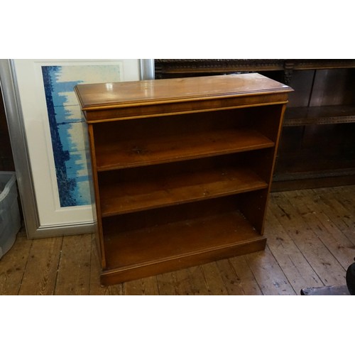 558 - An Open Fronted Bookcase in Chestnut with Peg Shelves. Measuring: 90cms across x 30cms deep x 90cms ... 