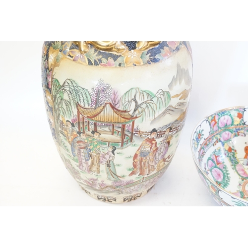 628 - A Cantonese enamelled Punch Bowl & a similar Vase decorated with a landscape.