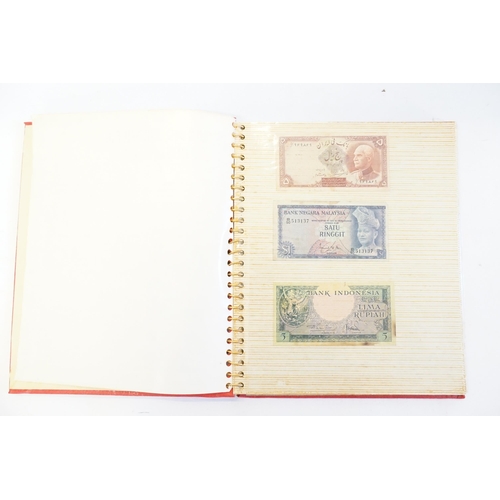 304 - Three Banknote Albums containing Old Banknotes from England, USA, India, Congo, Jamaica, Bahrain, Un... 