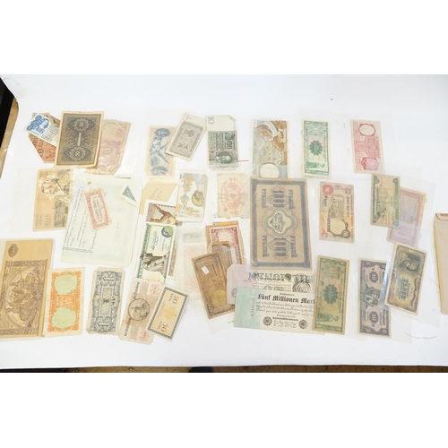 304 - Three Banknote Albums containing Old Banknotes from England, USA, India, Congo, Jamaica, Bahrain, Un... 