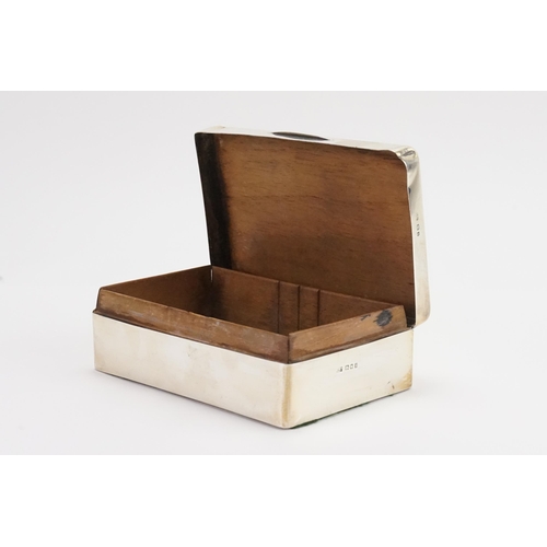 55 - A silver cigarette box.