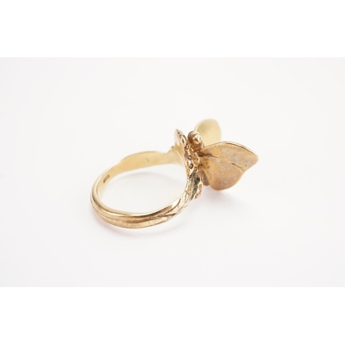 149 - A 9ct gold butterfly ring, set with a butterfly on a branch. Weight 4.9g. Size J.