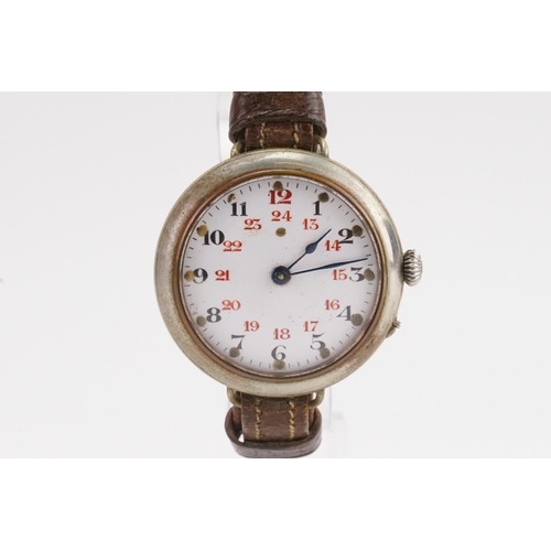 208 - A WWI Gentleman's Rail Road Dial Wristwatch with red and black numerals & leather strap. Marked Reg.... 