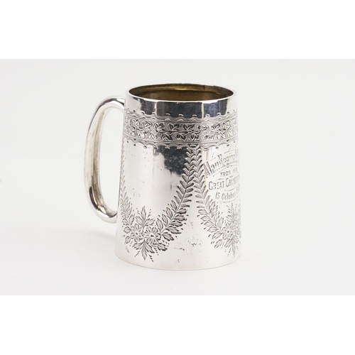 76 - A 1907 silver christening mug. Weight 101g.