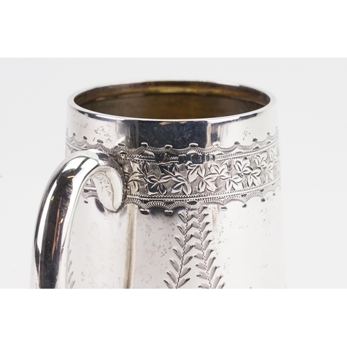 76 - A 1907 silver christening mug. Weight 101g.