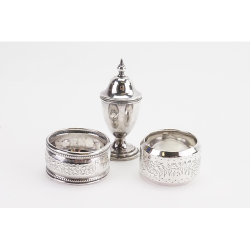 85 - A pair of silver napkin rings, along with a plated salt. Weight 26g.