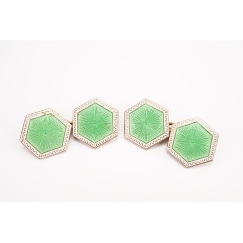 167 - A pair of 9ct gold green enamelled cufflinks. Weight 6g.