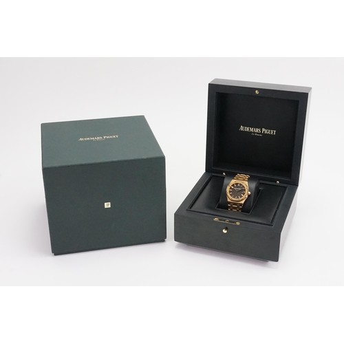 206 - A ladies Audemars Piguet Royal Oak 33m 18ct Rose Gold Brown Dial watch. Documents and purchase invoi... 