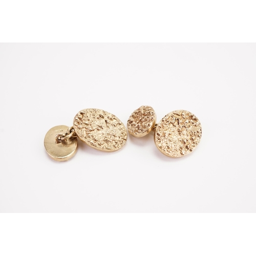 170 - A pair of 9ct gold bark design cufflinks. Weight 17.8g.