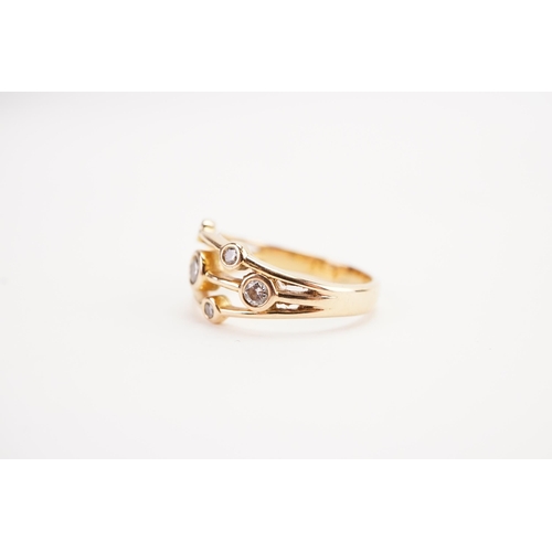 160 - A 18ct rose gold and diamond set ring, set with seven diamonds. Weight 4.5g. Size O.