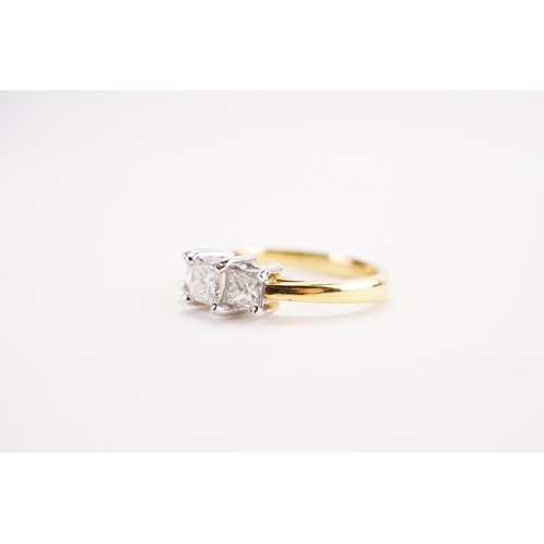 161 - A 18ct yellow gold three stone diamond ring set with princess cut diamonds. (approx 0.3ct largest an... 