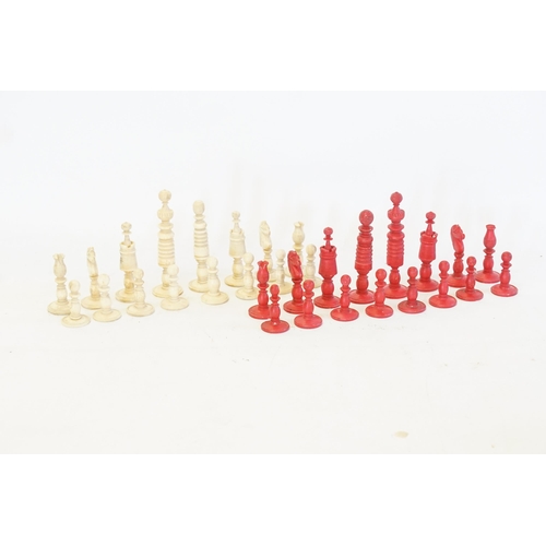 743 - An Antique Wooden Red and Cream Chess Set. (Complete).