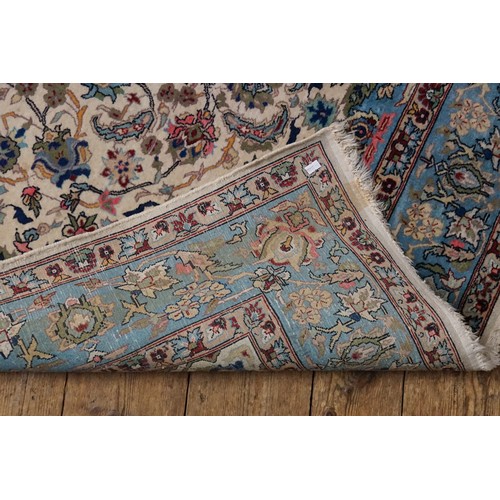 618 - A Blue & Cream Ground Rug with Frill. Measuring: 200cms x 140cms.