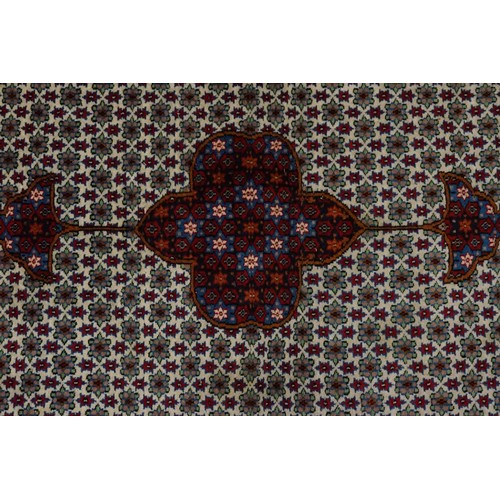 619 - A Dark Red & Cream Rug with Frill (AF). Measuring: 184cms x 125cms.