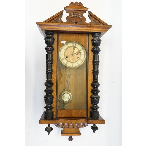 239 - A Late 19th Century Austrian design Wall Clock with stained black columns, Swan Neck Pedestal with a... 