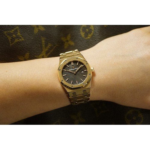 206 - A ladies Audemars Piguet Royal Oak 33m 18ct Rose Gold Brown Dial watch. Documents and purchase invoi... 