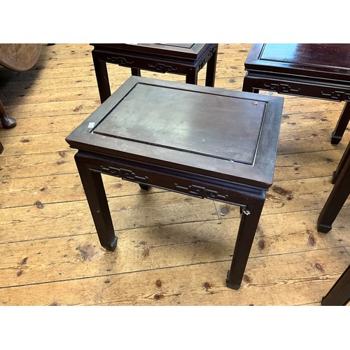 545 - A Set of Four Japanese Hardwood Whatnot Tables with inset Top Panels, Key Boarded Tops & Scroll Feet... 