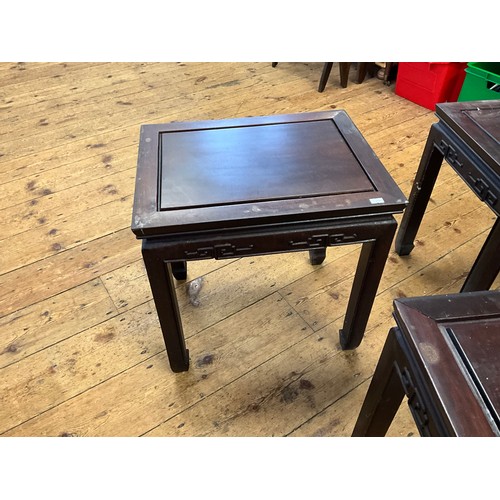 545 - A Set of Four Japanese Hardwood Whatnot Tables with inset Top Panels, Key Boarded Tops & Scroll Feet... 